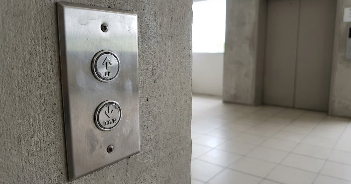 Understanding why elevators have both up and down buttons